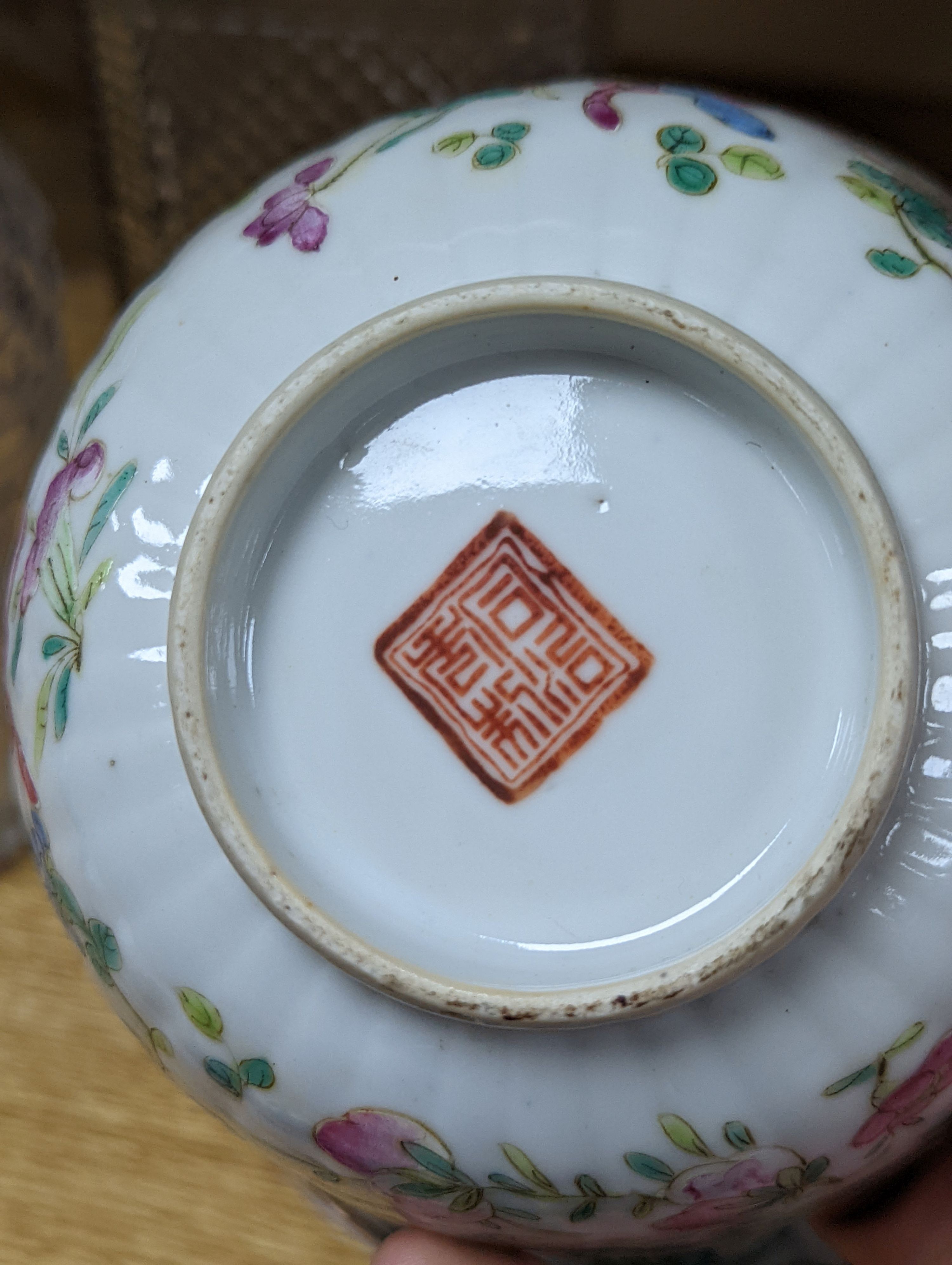 A 19th century Chinese famille rose rice bowl, cover and stand, together with a blue and white dragon jar and similar bottle vase. Largest 18cm